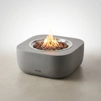 Westport 34 In. X 14 In. Grey round Concrete Propane Pit Table with Electronic Ignition Cover and Lava Rock — Studio Shot