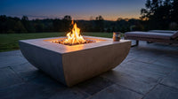 Westport 34 In. X 14 In. Grey round Concrete Propane Pit Table with Electronic Ignition Cover and Lava Rock — Lifestyle